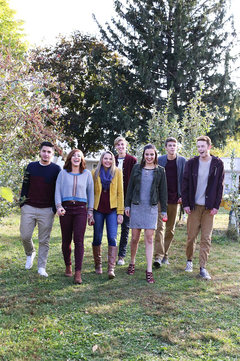 Friends walking together through Allen's Orchard